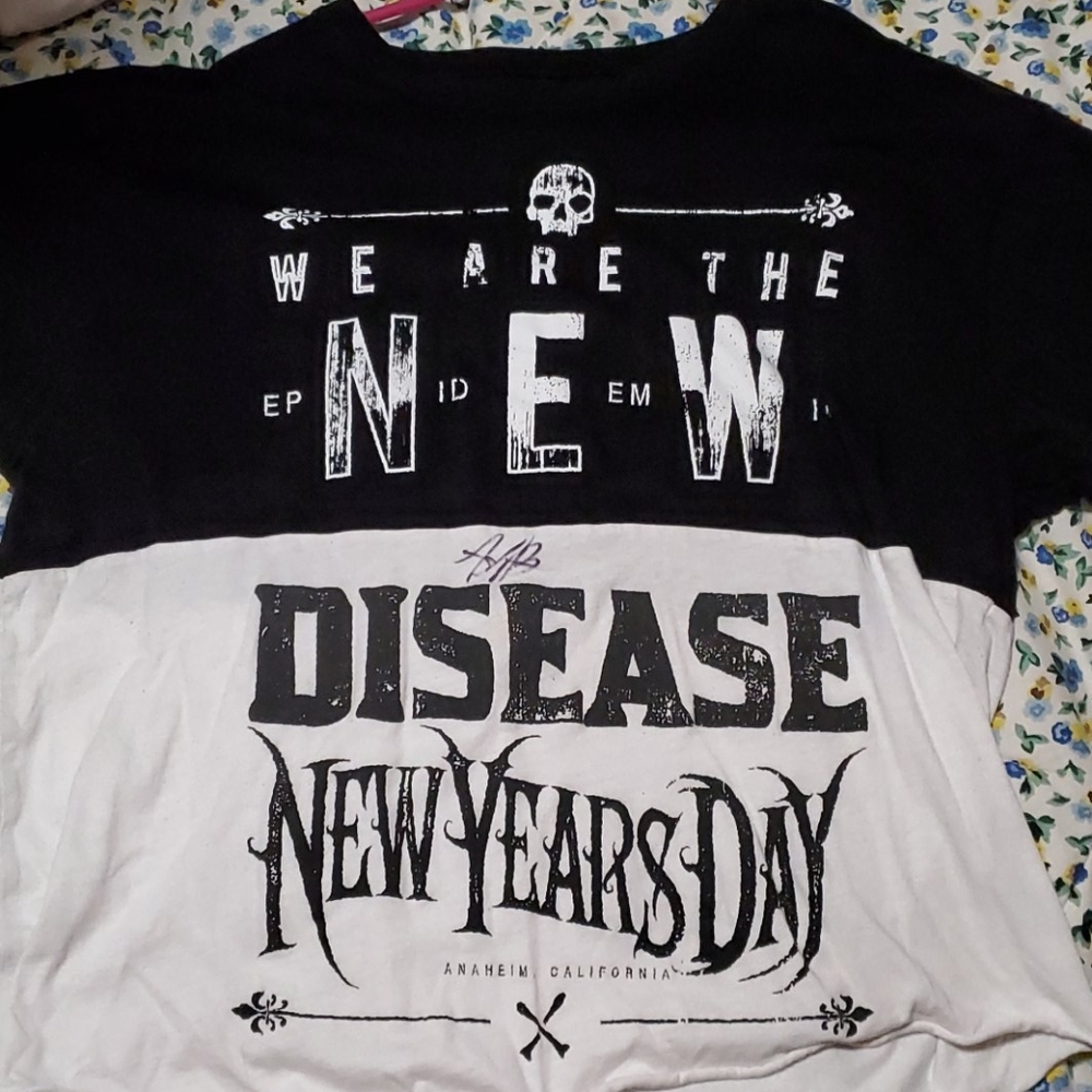 New Years Day(band) that is signed by Ash Costello